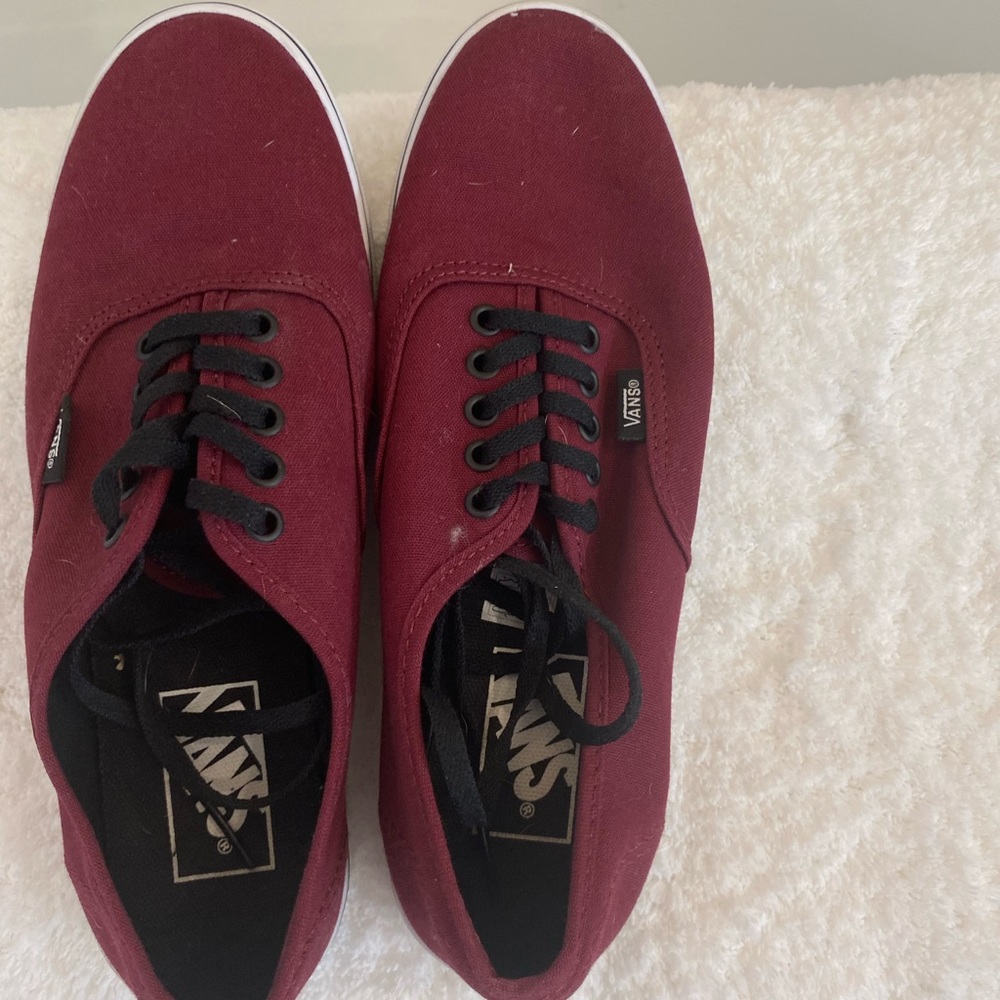 Vans Burgundy in color.  Size 7.5